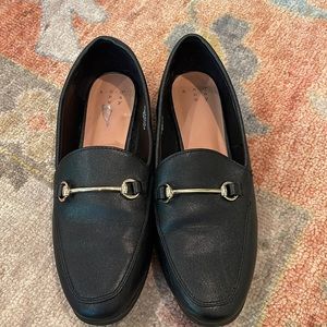 a new day black loafers with gold buckle